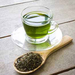 Green tea with fresh leaves